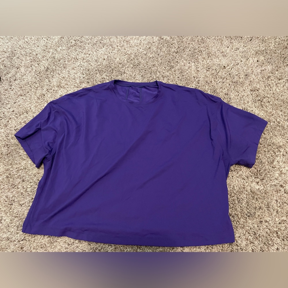 Worn once! Lululemon abrasion resistant training shirt in petrol purple, size 10